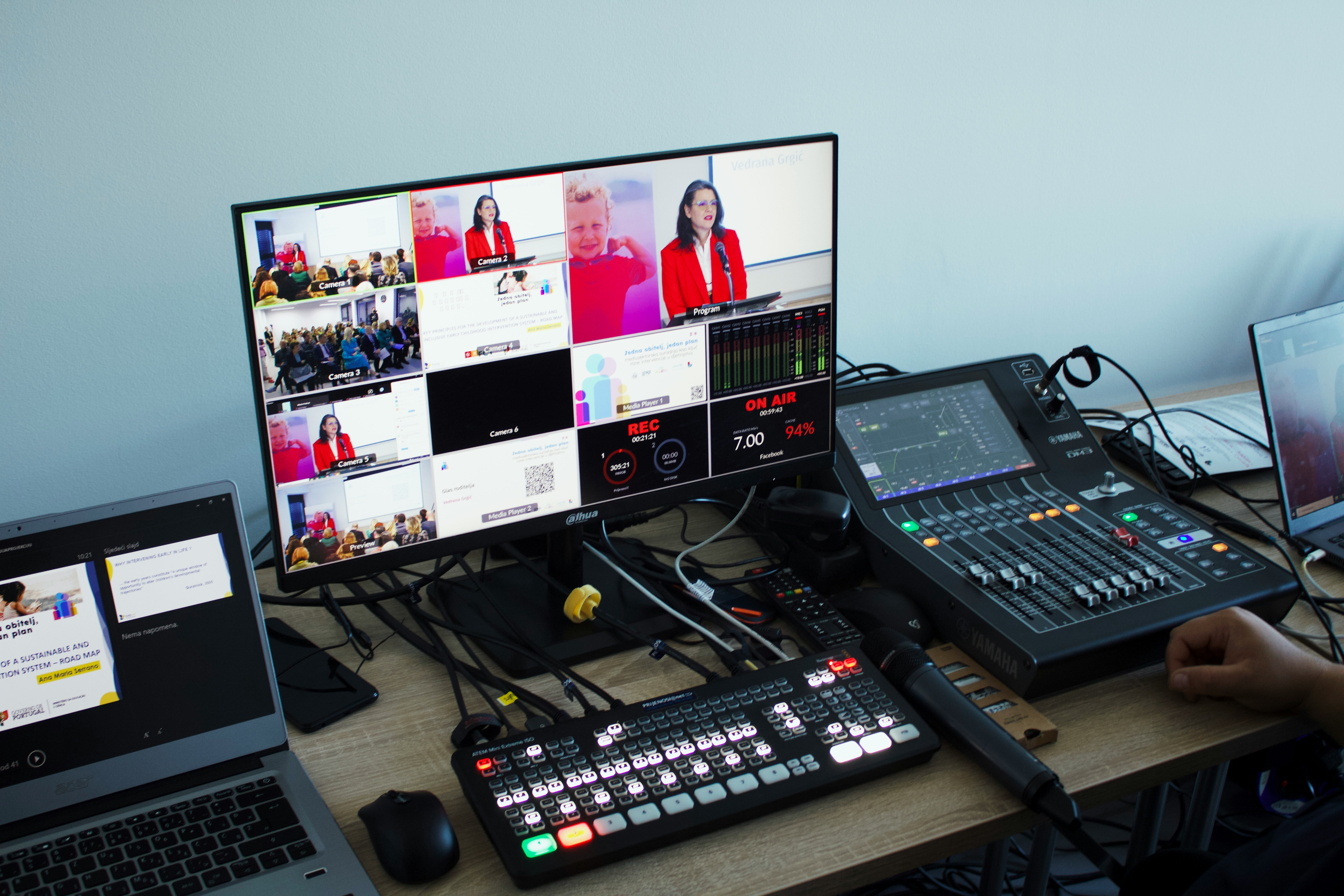 Camera monitor showing a live multi-source switch during a recording
